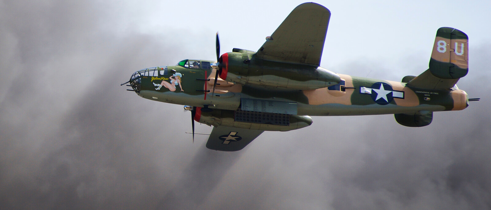 Commemorative Air Force, Central Texas Wing's 1944 B-25J Yellow Rose, San Marcos, TX Flying through smoke during the 'Tora Tora Tora' Pearl Harbor Attack Re-enactment - November 1st, 2014